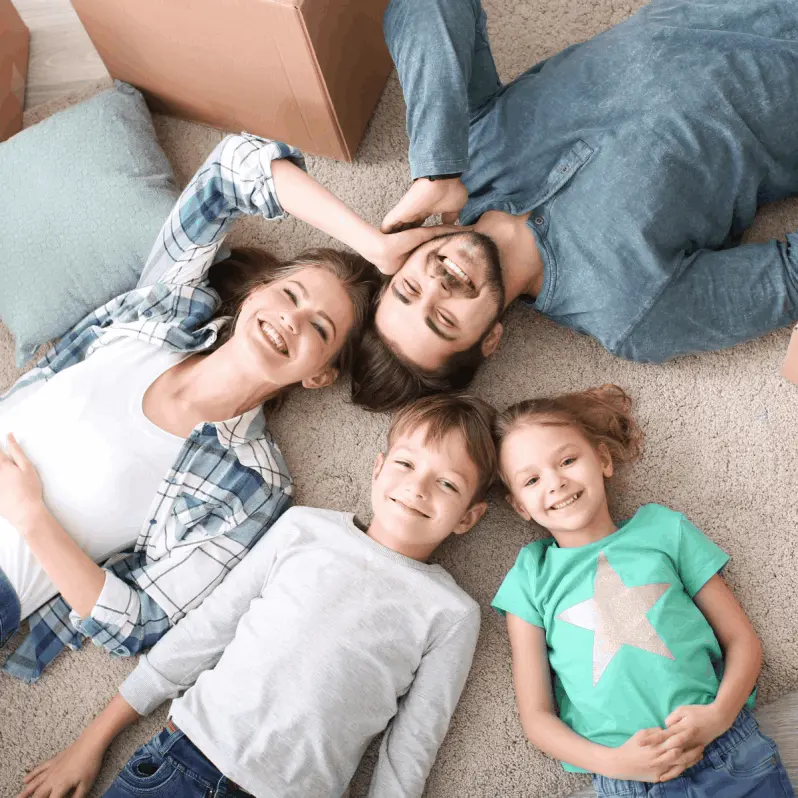 Family on Carpet Cleaning by Ecosuds Hamilton and Grimsby